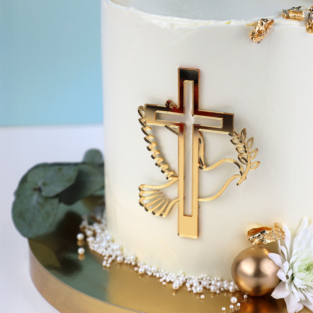 Złoty krzyżyk na tort