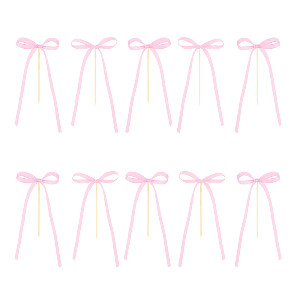 Różowe kokardki do tortu