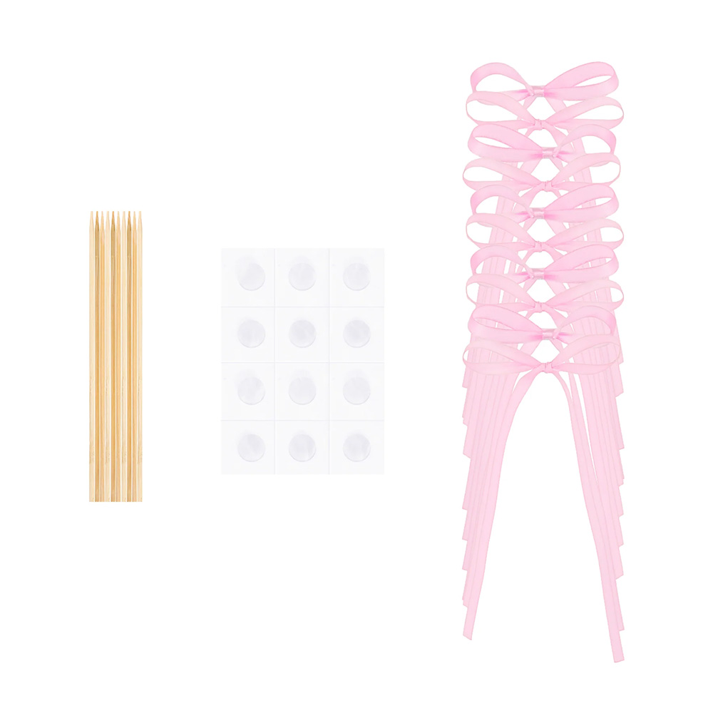 Różowe kokardki do tortu