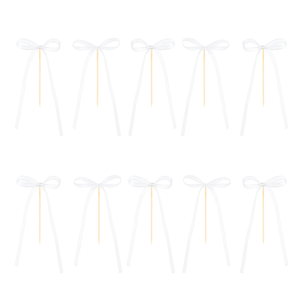 Białe kokardki do tortu